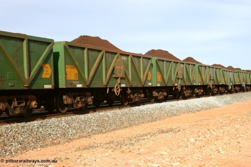 060531 5003
Binduli, AOPY 32382, with fleet number 904, one of seventy ex ANR coal waggons rebuilt from AOKF type by Bluebird Engineering SA in service with ARG on Koolyanobbing iron ore trains. They used to be three metres longer and originally built by Metropolitan Cammell Britain as GB type in 1952-55, seen here in the consist with sister waggons of a loaded train bound for West Kalgoorlie, May 31, 2006
Keywords: AOPY-type;AOPY32382;Bluebird-Engineering-SA;Metropolitan-Cammell-Britain;GB-type;