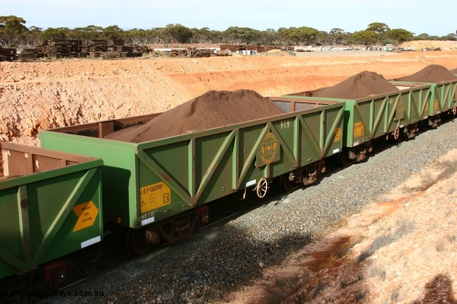 060531 5022
West Kalgoorlie, AOPY 32376, fleet number 919, one of seventy ex ANR coal waggons rebuilt from AOKF type by Bluebird Engineering SA in service with ARG on Koolyanobbing iron ore trains. They used to be three metres longer and originally built by Metropolitan Cammell Britain as GB type in 1952-55, May 31, 2006
Keywords: AOPY-type;AOPY32376;Bluebird-Engineering-SA;Metropolitan-Cammell-Britain;GB-type;