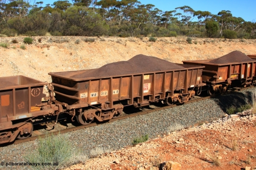 100602 8545
WO type iron ore waggon WO 31284 is one of a batch of eighty six built by WAGR Midland Workshops between 1967 and March 1968 with fleet number 164 for Koolyanobbing iron ore operations, with a 75 ton and 1018 ft³ capacity, seen here loaded with fines west of Binduli, June 2, 2010.
Keywords: WO-type;WO31284;WAGR-Midland-WS;