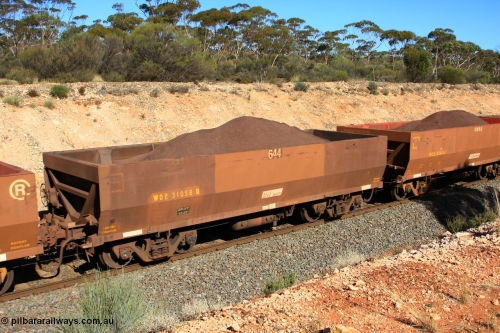 100602 8555
WOE type iron ore waggon WOE 31058 is one of a batch of fifteen built by Goninan WA between April and May 2002 with fleet number 644 for Koolyanobbing iron ore operations, with revised load of 82.5 tonne and PORTMAN painted out, seen here west of Binduli, June 2, 2010.
Keywords: WOE-type;WOE31058;Goninan-WA;