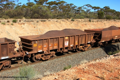 100602 8564
WO type iron ore waggon WO 31261 is one of a batch of eighty six built by WAGR Midland Workshops between 1967 and March 1968 with fleet number 147 for Koolyanobbing iron ore operations, with a 75 ton and 1018 ft³ capacity, seen here loaded with fines and having had the numbers re-painted, Binduli, June 2, 2010.
Keywords: WO-type;WO31261;WAGR-Midland-WS;