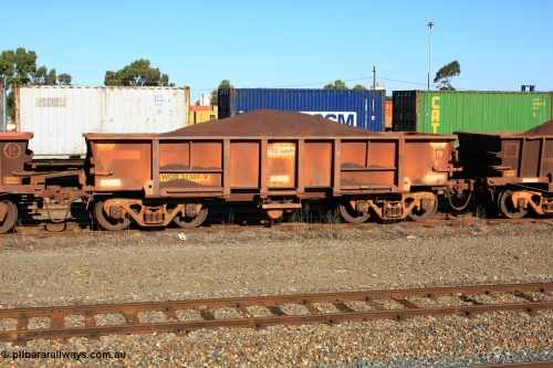 100602 8685
WOB type iron ore waggon WOB 31391 is one of a batch of twenty five built by Comeng WA between 1974 and 1975 and converted from Mt Newman high sided waggons by WAGR Midland Workshops with a capacity of 67 tons with fleet number 316 for Koolyanobbing iron ore operations. This waggon was also converted to a WSM type ballast hopper by re-fitting the cut down top section and having bottom discharge doors fitted, converted back to WOB in 1998, loaded with fines in West Kalgoorlie June 2, 2010.
Keywords: WOB-type;WOB31391;Comeng-WA;WSM-type;Mt-Newman-Mining;