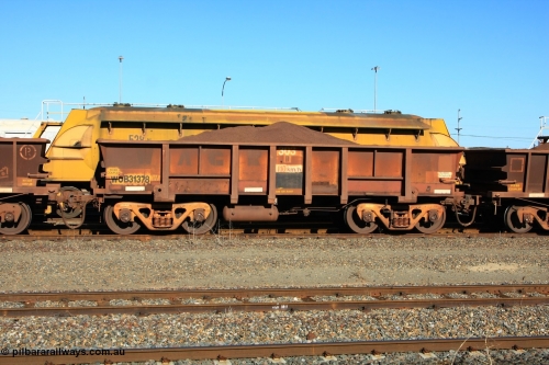 100602 8697
WOB type iron ore waggon WOB 31378 is one of a batch of twenty five built by Comeng WA between 1974 and 1975 and converted from Mt Newman high sided waggons by WAGR Midland Workshops with a capacity of 67 tons with fleet number 303 for Koolyanobbing iron ore operations, loaded with fines, West Kalgoorlie June 2, 2010.
Keywords: WOB-type;WOB31378;Comeng-WA;Mt-Newman-Mining;