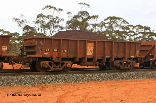 100605 9327
WO type iron ore waggon WO 31407 is one of a batch of eleven replacement waggons built by WAGR Midland Workshops between 1970 and 1971 with fleet number 185 for Koolyanobbing iron ore operations, with a 75 ton and 1018 ft³ capacity. This unit was converted to WOC for coal in 1986 till 1994 when it was re-classed back to WO, Binduli Triangle, loaded with fines, June 5, 2010.
Keywords: WO-type;WO31407;WAGR-Midland-WS;