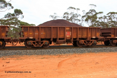 100605 9332
WO type iron ore waggon WO 31207 is one of a batch of eighty six built by WAGR Midland Workshops between 1967 and March 1968 with fleet number 103 for Koolyanobbing iron ore operations, with a 75 ton and 1018 ft.³ capacity, Binduli Triangle, loaded with fines, June 5, 2010. This unit was converted to WOS superphosphate in the late 1980s till 1994 when it was re-classed back to WO.
Keywords: WO-type;WO31207;WAGR-Midland-WS;WOS-type;