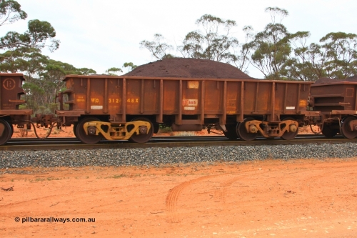 100605 9339
WO type iron ore waggon WO 31248 is one of a batch of eighty six built by WAGR Midland Workshops between 1967 and March 1968 with fleet number 139 for Koolyanobbing iron ore operations, with a 75 ton and 1018 ft³ capacity, loaded with fines seen here at Binduli, June 5, 2010. This unit was converted to WOG for gypsum in late 1980s till 1990 then reclassed to WOS for superphosphate before being re-classed back to WO in 1994.
Keywords: WO-type;WO31248;WAGR-Midland-WS;
