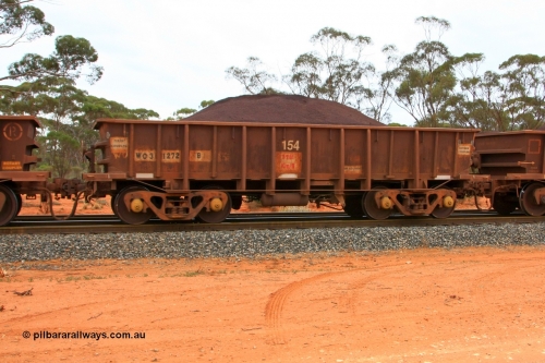 100605 9343
WO type iron ore waggon WO 31272 is one of a batch of eighty six built by WAGR Midland Workshops between 1967 and March 1968 with fleet number 154 for Koolyanobbing iron ore operations, with a 75 ton and 1018 ft³ capacity, Binduli Triangle, loaded with fines, June 5, 2010.
Keywords: WO-type;WO31272;WAGR-Midland-WS;