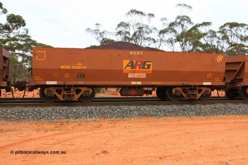 100605 9354
WOE type iron ore waggon WOE 33501 is one of a batch of one hundred and twenty eight built by United Group Rail WA between August 2008 and March 2009 with serial number 950211-041 and fleet number 8997 for Koolyanobbing iron ore operations, with ARG decal, build date of 10/2008 and revised load of 82.5 tonnes, seen here Binduli Triangle June 5, 2010.
Keywords: WOE-type;WOE33501;United-Group-Rail-WA;950211-041;