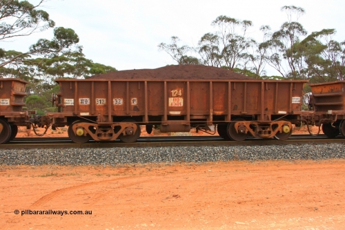 100605 9366
WO type iron ore waggon WO 31232 is one of a batch of eighty six built by WAGR Midland Workshops between 1967 and March 1968 with fleet number 124 for Koolyanobbing iron ore operations, with a 75 ton and 1018 ft³ capacity, Binduli Triangle, loaded with fines, June 5, 2010. This unit was converted to WOS superphosphate in the late 1980s till 1994 when it was re-classed back to WO.
Keywords: WO-type;WO31232;WAGR-Midland-WS;WOS-type;