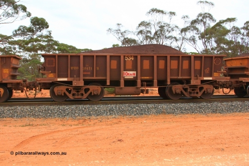 100605 9369
WOD type iron ore waggon WOD 31471 is one of a batch of sixty two built by Goninan WA between April and August 2000 with serial number 950086-043 and fleet number 534 for Koolyanobbing iron ore operations with a 75 ton capacity for Portman Mining to cart their Koolyanobbing iron ore to Esperance, now with PORTMAN painted out, Binduli Triangle, loaded with fines, June 5, 2010.
Keywords: WOD-type;WOD31471;Goninan-WA;950086-043;