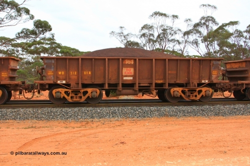 100605 9371
WO type iron ore waggon WO 31281 is one of a batch of eighty six built by WAGR Midland Workshops between 1967 and March 1968 with fleet number 161 for Koolyanobbing iron ore operations, with a 75 ton and 1018 ft³ capacity, Binduli Triangle, loaded with fines, June 5, 2010. This unit was converted to WOC for coal in 1986 till 1994 when it was re-classed back to WO.
Keywords: WO-type;WO31281;WAGR-Midland-WS;