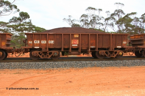 100605 9377
WO type iron ore waggon WO 31404 is one of a batch of eleven replacement waggons built by WAGR Midland Workshops between 1970 and 1971 with fleet number 182 for Koolyanobbing iron ore operations, with a 75 ton and 1018 ft³ capacity, Binduli Triangle, loaded with fines, June 5, 2010.
Keywords: WO-type;WO31404;WAGR-Midland-WS;