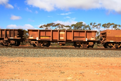 100729 01488
WOB type iron ore waggon WOB 31391 is one of a batch of twenty five built by Comeng WA between 1974 and 1975 and converted from Mt Newman high sided waggons by WAGR Midland Workshops with a capacity of 67 tons with fleet number 316 for Koolyanobbing iron ore operations. This waggon was also converted to a WSM type ballast hopper by re-fitting the cut down top section and having bottom discharge doors fitted, converted back to WOB in 1998, returning empty to Koolyanobbing at Binduli, July 29, 2010.
Keywords: WOB-type;WOB31391;Comeng-WA;WSM-type;Mt-Newman-Mining;
