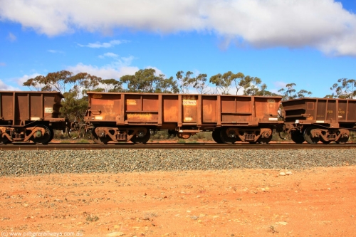 100729 01490
WOB type iron ore waggon WOB 31400 is one of a batch of twenty five built by Comeng WA between 1974 and 1975 and converted from Mt Newman high sided waggons by WAGR Midland Workshops with a capacity of 67 tons with fleet number 324 for Koolyanobbing iron ore operations. This waggon was also converted to a WSM type ballast hopper by re-fitting the cut down top section and having bottom discharge doors fitted, converted back to WOB in 1998, on a loaded train at Binduli, July 29, 2010.
Keywords: WOB-type;WOB31400;Comeng-WA;WSM-type;Mt-Newman-Mining;