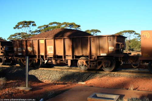 100731 02279
WO type iron ore waggon WO 31205 is one of a batch of eighty six built by WAGR Midland Workshops between 1967 and March 1968 with fleet number 102 for Koolyanobbing iron ore operations, with a 75 ton and 1018 ft.³ capacity, on loaded train 6413 at Binduli Triangle, July 31, 2010. This unit was converted to WOS superphosphate in the late 1980s till 1994 when it was re-classed back to WO.
Keywords: WO-type;WO31205;WAGR-Midland-WS;WOS-type;