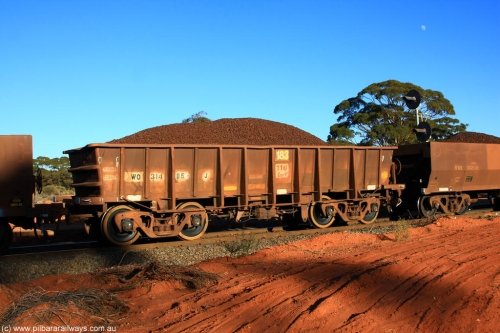 100731 02300
WO type iron ore waggon WO 31405 is one of a batch of eleven replacement waggons built by WAGR Midland Workshops between 1970 and 1971 with fleet number 183 for Koolyanobbing iron ore operations, with a 75 ton and 1018 ft³ capacity, with new wheel sets, on loaded train 6413 at Binduli Triangle, July 31, 2010.
Keywords: WO-type;WO31405;WAGR-Midland-WS;