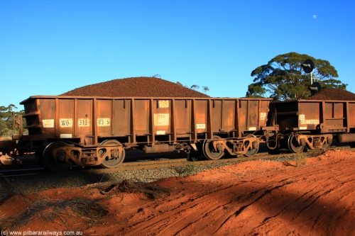 100731 02345
WO type iron ore waggon WO 31283 is one of a batch of eighty six built by WAGR Midland Workshops between 1967 and March 1968 with fleet number 163 for Koolyanobbing iron ore operations, with a 75 ton and 1018 ft³ capacity, on loaded train 6413 at Binduli Triangle, July 31, 2010. This unit was converted to WOS superphosphate in the late 1980s till 1994 when it was re-classed back to WO.
Keywords: WO-type;WO31283;31283;WAGR-Midland-WS;WOS-type;