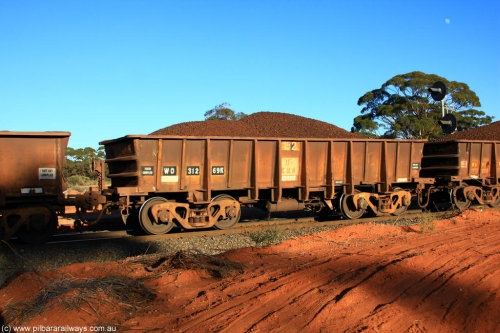 100731 02347
WO type iron ore waggon WO 31269 is one of a batch of eighty six built by WAGR Midland Workshops between 1967 and March 1968 with fleet number 152 for Koolyanobbing iron ore operations, with a 75 ton and 1018 ft³ capacity, on loaded train 6413 at Binduli Triangle, 31st July 2010. This unit was converted to WOC for coal in 1986 till 1994 when it was re-classed back to WO.
Keywords: WO-type;WO31269;WAGR-Midland-WS;