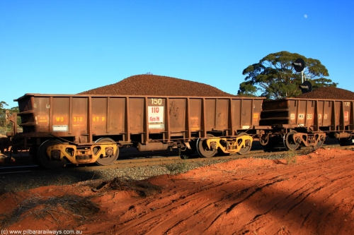 100731 02354
WO type iron ore waggon WO 31267 is one of a batch of eighty six built by WAGR Midland Workshops between 1967 and March 1968 with fleet number 150 for Koolyanobbing iron ore operations, with a 75 ton and 1018 ft³ capacity, on loaded train 6413 at Binduli Triangle, 31st July 2010. This unit was converted to WOC for coal in 1986 till 1994 when it was re-classed back to WO.
Keywords: WO-type;WO31267;WAGR-Midland-WS;