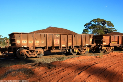 100731 02355
WO type iron ore waggon WO 31299 is one of a batch of fifteen built by WAGR Midland Workshops between July and October 1968 with fleet number 178 for Koolyanobbing iron ore operations, with a 75 ton and 1018 ft³ capacity, on loaded train 6413 at Binduli Triangle, July 31, 2010. This unit was converted to WOS superphosphate in the late 1980s till 1994 when it was re-classed back to WO.
Keywords: WO-type;WO31299;WAGR-Midland-WS;WOS-type;