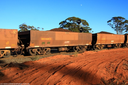 100731 02378
WOE type iron ore waggon WOE 31066 is one of a batch of one hundred and thirty built by Goninan WA between March and August 2001 with serial number 950092-056 and fleet number 652 for Koolyanobbing iron ore operations, on loaded train 6413 at Binduli Triangle, July 31, 2010.
Keywords: WOE-type;WOE31066;Goninan-WA;950092-056;