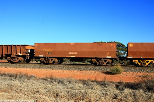 100731 02432
WOE type iron ore waggon WOE 33412 is one of a batch of one hundred and forty one built by United Group Rail WA between November 2005 and April 2006 with serial number 950142-117 and fleet number 8911 for Koolyanobbing iron ore operations, on empty train 6418 at Binduli Triangle, July 31, 2010.
Keywords: WOE-type;WOE33412;United-Group-Rail-WA;950142-117;