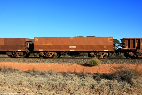 100731 02441
WOE type iron ore waggon WOE 33517 is one of a batch of one hundred and twenty eight built by United Group Rail WA between August 2008 and March 2009 with serial number 950211-057 and fleet number 9010 for Koolyanobbing iron ore operations, on empty train 6418 at Binduli Triangle, 31st July 2010.
Keywords: WOE-type;WOE33517;United-Group-Rail-WA;950211-057;