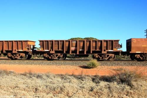 100731 02448
WOD type iron ore waggon WOD 31486 is one of a batch of sixty two built by Goninan WA between April and August 2000 with serial number 950086-058 and fleet number 549 for Koolyanobbing iron ore operations with a 75 ton capacity for Portman Mining to cart their Koolyanobbing iron ore to Esperance, now with PORTMAN painted out, on empty train 6418 at Binduli Triangle, 31st July 2010.
Keywords: WOD-type;WOD31486;Goninan-WA;950086-058;