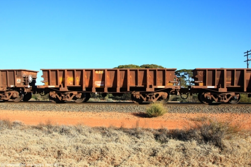 100731 02449
WOC type iron ore waggon WOC 31369 is one of a batch of thirty built by Goninan WA between October 1997 to January 1998 with fleet number 429 for Koolyanobbing iron ore operations with a 75 ton capacity, on empty train 6418 at Binduli Triangle, 31st July 2010.
Keywords: WOC-type;WOC31369;Goninan-WA;