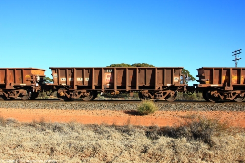 100731 02450
WO type iron ore waggon WO 31216 is one of a batch of eighty six built by WAGR Midland Workshops between 1967 and March 1968 with fleet number 112 for Koolyanobbing iron ore operations, with a 75 ton and 1018 ft³ capacity, on empty train 6418 at Binduli Triangle, July 31, 2010. This unit was converted to WOS superphosphate in the late 1980s till 1994 when it was re-classed back to WO.
Keywords: WO-type;WO31216;WAGR-Midland-WS;WOS-type;