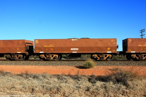 100731 02454
WOE type iron ore waggon WOE 33572 is one of a batch of one hundred and twenty eight built by United Group Rail WA between August 2008 and March 2009 with serial number 950211-112 and fleet number 9073 for Koolyanobbing iron ore operations, on empty train 6418 at Binduli Triangle, July 31, 2010.
Keywords: WOE-type;WOE33572;United-Group-Rail-WA;950211-112;