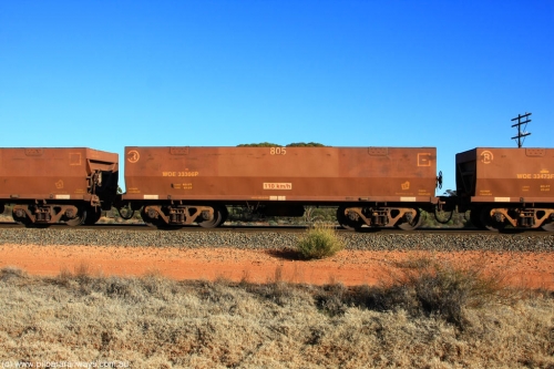 100731 02490
WOE type iron ore waggon WOE 33306 is one of a batch of one hundred and forty one built by United Goninan WA between November 2005 and April 2006 with serial number 950142-011 and fleet number 805 for Koolyanobbing iron ore operations, on empty train 6418 at Binduli Triangle, July 31, 2010.
Keywords: WOE-type;WOE33306;United-Goninan-WA;950142-011;