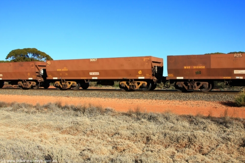 100731 02510
WOE type iron ore waggon WOE 33522 is one of a batch of one hundred and twenty eight built by United Group Rail WA between August 2008 and March 2009 with serial number 950211-062 and fleet number 9067 for Koolyanobbing iron ore operations, on empty train 6418 at Binduli Triangle, July 31, 2010.
Keywords: WOE-type;WOE33522;United-Group-Rail-WA;950211-062;