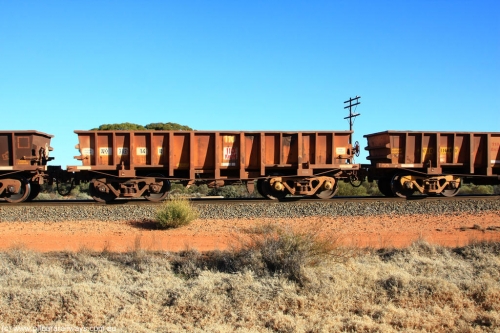 100731 02528
WO type iron ore waggon WO 31214 is one of a batch of sixty two built by Goninan WA between April and August 2000 with serial number 950086-002 and fleet number 110 for Koolyanobbing iron ore operations, and is a Goninan built replacement WO type waggon that replaces the original WAGR built WO type waggon with a WOD type with square features opposed to the curved ones as on the original WO, on empty train 6418 at Binduli Triangle, July 31, 2010.
Keywords: WO-type;WO31214;Goninan-WA;950086-002;