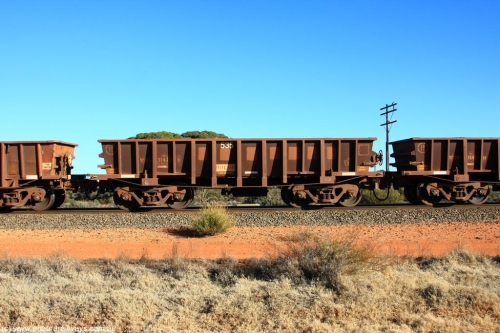 100731 02530
WOD type iron ore waggon WOD 31472 is one of a batch of sixty two built by Goninan WA between April and August 2000 with serial number 950086-044 and fleet number 535 for Koolyanobbing iron ore operations with a 75 ton capacity for Portman Mining to cart their Koolyanobbing iron ore to Esperance, now with PORTMAN painted out, on empty train 6418 at Binduli Triangle, July 31, 2010.
Keywords: WOD-type;WOD31472;Goninan-WA;950086-044;