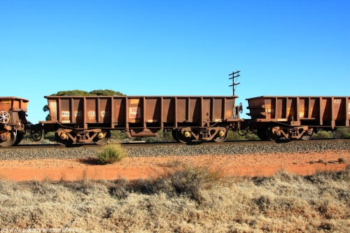 100731 02539
WOA type iron ore waggon WOA 31302 is leader of a batch of thirty nine built by WAGR Midland Workshops between 1970 and 1971 with fleet number 201 for Koolyanobbing iron ore operations, with a 75 ton and 1018 ft³ capacity, on empty train 6418 at Binduli Triangle, July 31, 2010.
Keywords: WOA-type;WOA31302;WAGR-Midland-WS;type-leader;
