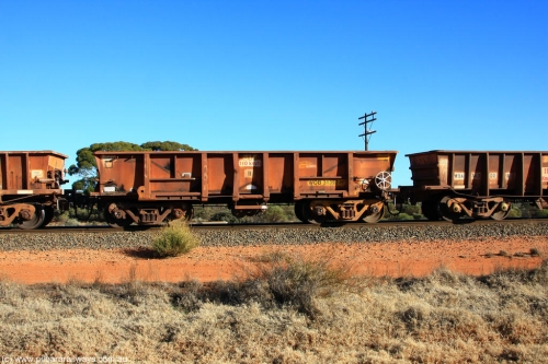 100731 02540
WOB type iron ore waggon WOB 31392 is one of a batch of twenty five built by Comeng WA between 1974 and 1975 and converted from Mt Newman high sided waggons by WAGR Midland Workshops with a capacity of 67 tons with fleet number 317 for Koolyanobbing iron ore operations, this waggon was converted to a WSM ballast hopper, then converted back to a WOB by WAGR Midland Workshops, and started life as a Comeng built Mt Newman Mining ore car in 1974. It was originally numbered 31391 by WAGR, on empty train 6418 at Binduli Triangle, July 31, 2010.
Keywords: WOB-type;WOB31392;Comeng-WA;WSM-type;Mt-Newman-Mining;