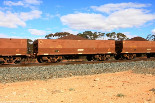 100731 02827
WOE type iron ore waggon WOE 33259 is one of a batch of twenty seven built by Goninan WA between September and October 2002 with serial number 950103-026 and fleet number 758 for Koolyanobbing iron ore operations, on loaded train 7415 at Binduli Triangle, July 31, 2010.
Keywords: WOE-type;WOE33259;Goninan-WA;950103-026;