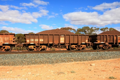 100731 02849
WO type iron ore waggon WO 31411 is one of a batch of eleven replacement waggons built by WAGR Midland Workshops between 1970 and 1971 with fleet number 187 for Koolyanobbing iron ore operations, with a 75 ton and 1018 ft³ capacity, on loaded train 7415 at Binduli Triangle, July 31, 2010. This unit was converted to WOC for coal in 1986 till 1994 when it was re-classed back to WO.
Keywords: WO-type;WO31411;WAGR-Midland-WS;