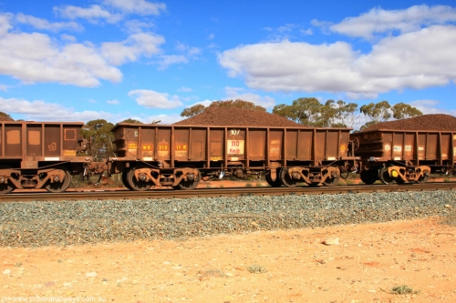 100731 02851
WO type iron ore waggon WO 31211 is one of a batch of eighty six built by WAGR Midland Workshops between 1967 and March 1968 with fleet number 107 for Koolyanobbing iron ore operations, with a 75 ton and 1018 ft³ capacity, on loaded train 7415 at Binduli Triangle, July 31, 2010. This unit was converted to WOC for coal in 1986 till 1994 when it was re-classed back to WO.
Keywords: WO-type;WO31211;WAGR-Midland-WS;