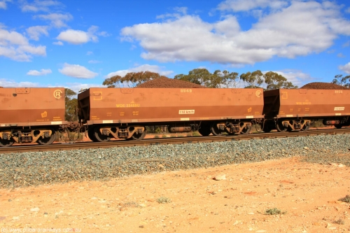 100731 02900
WOE type iron ore waggon WOE 33459 is leader of a batch of one hundred and twenty eight built by United Group Rail WA between August 2008 and March 2009 with serial number 950211-001 and fleet number 8949 for Koolyanobbing iron ore operations, on loaded train 7415 at Binduli Triangle, July 31, 2010.
Keywords: WOE-type;WOE33459;United-Group-Rail-WA;950211-001;