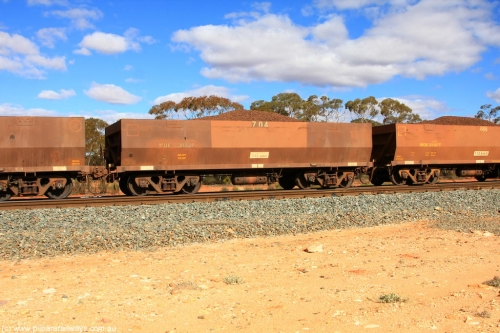 100731 02908
WOE type iron ore waggon WOE 31122 is one of a batch of one hundred and thirty built by Goninan WA between March and August 2001 with serial number 950092-112 and fleet number 704 for Koolyanobbing iron ore operations, on loaded train 7415 at Binduli Triangle, 31st July 2010.
Keywords: WOE-type;WOE31122;Goninan-WA;950092-112;