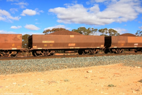 100731 02915
WOE type iron ore waggon WOE 31073 is one of a batch of one hundred and thirty built by Goninan WA between March and August 2001 with serial number 950092-063 and fleet number 659 for Koolyanobbing iron ore operations, on loaded train 7415 at Binduli Triangle, July 31, 2010.
Keywords: WOE-type;WOE31073;Goninan-WA;950092-063;
