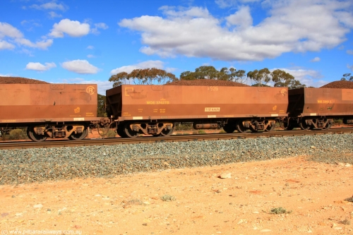 100731 02926
WOE type iron ore waggon WOE 33427 is one of a batch of one hundred and forty one built by United Group Rail WA between November 2005 and April 2006 with serial number 950142-132 and fleet number 8926 for Koolyanobbing iron ore operations, on loaded train 7415 at Binduli Triangle, July 31, 2010.
Keywords: WOE-type;WOE33427;United-Group-Rail-WA;950142-132;