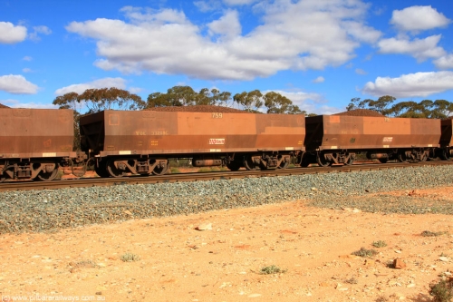 100731 02928
WOE type iron ore waggon WOE 33260 is one of a batch of twenty seven built by Goninan WA between September and October 2002 with serial number 950103-027 and fleet number 759 for Koolyanobbing iron ore operations, on loaded train 7415 at Binduli Triangle, July 31, 2010.
Keywords: WOE-type;WOE33260;Goninan-WA;950103-027;