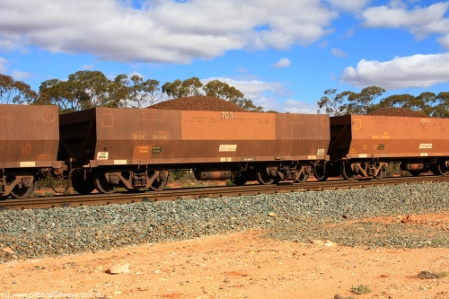 100731 02933
WOE type iron ore waggon WOE 31121 is one of a batch of one hundred and thirty built by Goninan WA between March and August 2001 with serial number 950092-111 and fleet number 703 for Koolyanobbing iron ore operations, on loaded train 7415 at Binduli Triangle, July 31, 2010.
Keywords: WOE-type;WOE31121;Goninan-WA;950092-111;