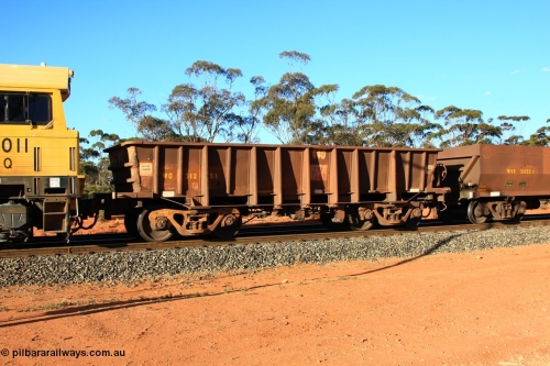 100731 03056
WO type iron ore waggon WO 31251 is one of a batch of eighty six built by WAGR Midland Workshops between 1967 and March 1968 with fleet number 140 for Koolyanobbing iron ore operations, with a 75 ton and 1018 ft³ capacity, empty train arriving at Binduli Triangle, July 31, 2010. This unit was converted to WOC for coal in 1986 till 1990 when it was reclassed to WOG for gypsum, then it was re-classed back to WO in 1994.
Keywords: WO-type;WO31251;WAGR-Midland-WS;