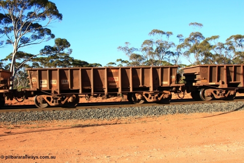100731 03073
WO type iron ore waggon WO 31275 is one of a batch of eighty six built by WAGR Midland Workshops between 1967 and March 1968 with fleet number 157 for Koolyanobbing iron ore operations, with a 75 ton and 1018 ft³ capacity, empty train arriving at Binduli Triangle, 31st July 2010. This unit was converted to WOC for coal in 1986 till 1994 when it was re-classed back to WO.
Keywords: WO-type;WO31275;WAGR-Midland-WS;