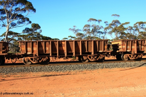 100731 03077
WO type iron ore waggon WO 31219 is one of a batch of eighty six built by WAGR Midland Workshops between 1967 and March 1968 with fleet number 114 for Koolyanobbing iron ore operations, with a 75 ton and 1018 ft³ capacity, empty train arriving at Binduli Triangle, 31st July 2010. This unit was converted to WOS superphosphate in the late 1980s till 1994 when it was re-classed back to WO.
Keywords: WO-type;WO31219;WAGR-Midland-WS;WOS-type;