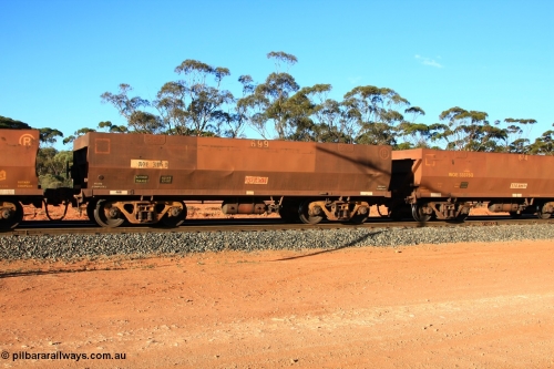 100731 03153
WOE type iron ore waggon WOE 31116 is one of a batch of one hundred and thirty built by Goninan WA between March and August 2001 with serial number 950092-106 and fleet number 699 for Koolyanobbing iron ore operations with PORTMAN painted out and the load revised to 82.5 tonnes, empty train arriving at Binduli Triangle, 31st July 2010.
Keywords: WOE-type;WOE31116;Goninan-WA;950092-106;